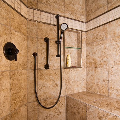 Ballwin, MO | Porcelain tile for shower with bench, shower niche, and straight drain*